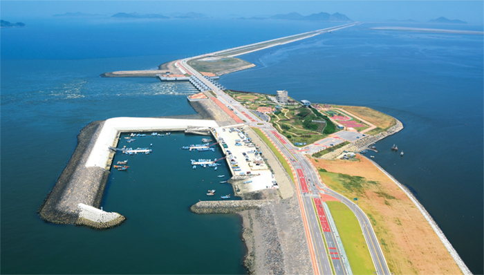 Saemangeum Embankment. South Korea constructed a 33.9km–long seawall that connects Gunsan to Buan in Jeollabuk-do Province, turning wetland and sea into reclaimed land. Saemangeum was certified by Guinness World Records as the longest man-made sea barrier in the world. The project added a total area of 409 square kilometers to the Korean Peninsula.